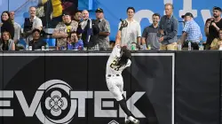 Padres' Fernando Tatis Jr makes incredible catch at wall, but Reds catcher gets last laugh